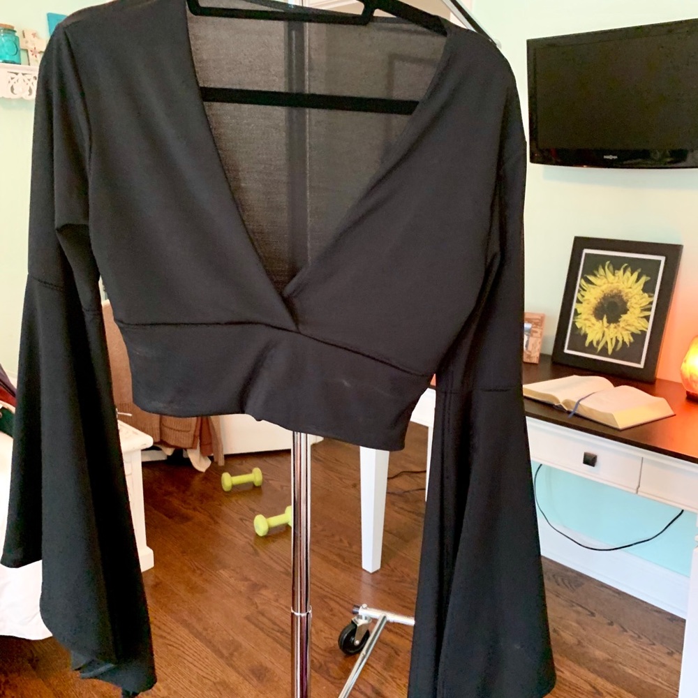 Black cropped, bell sleeve.